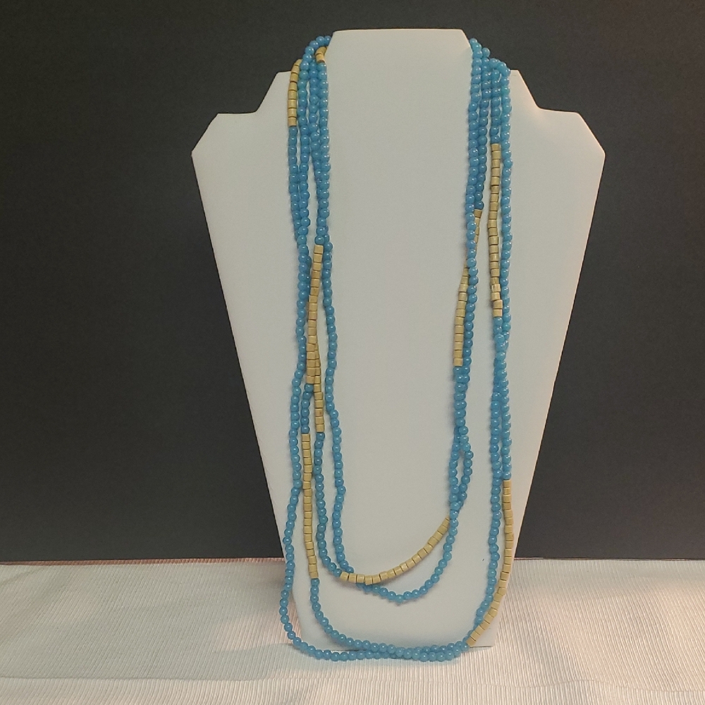 Two 28 Inch Blue and Tan Beaded Necklaces